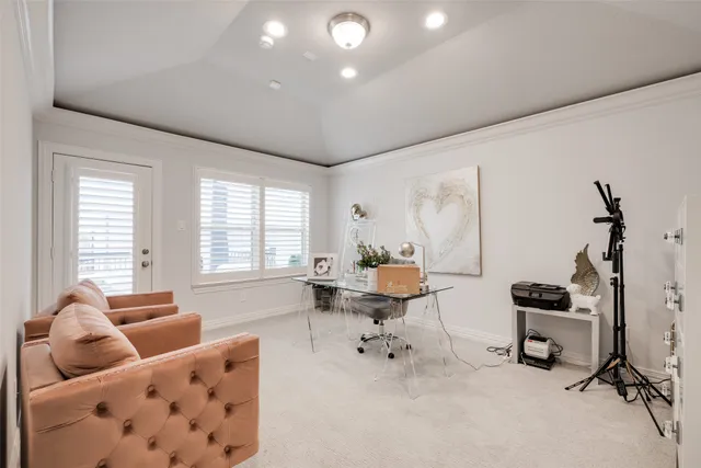 a view of a patio with table and chairs