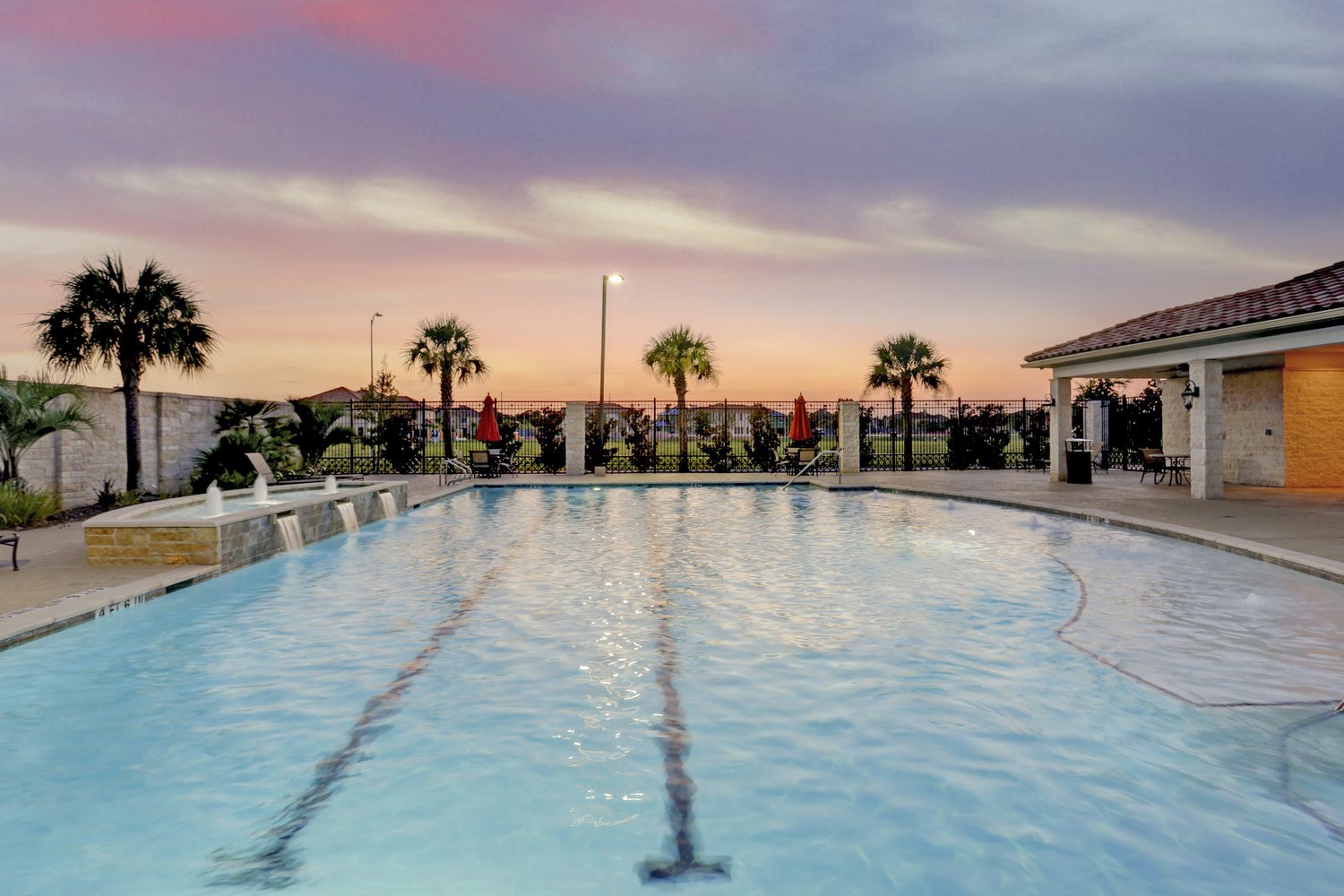 13611 Teal Bluff Lane Houston, TX 77077 - Photo 43 of 46 a view of a swimming pool with a lake view