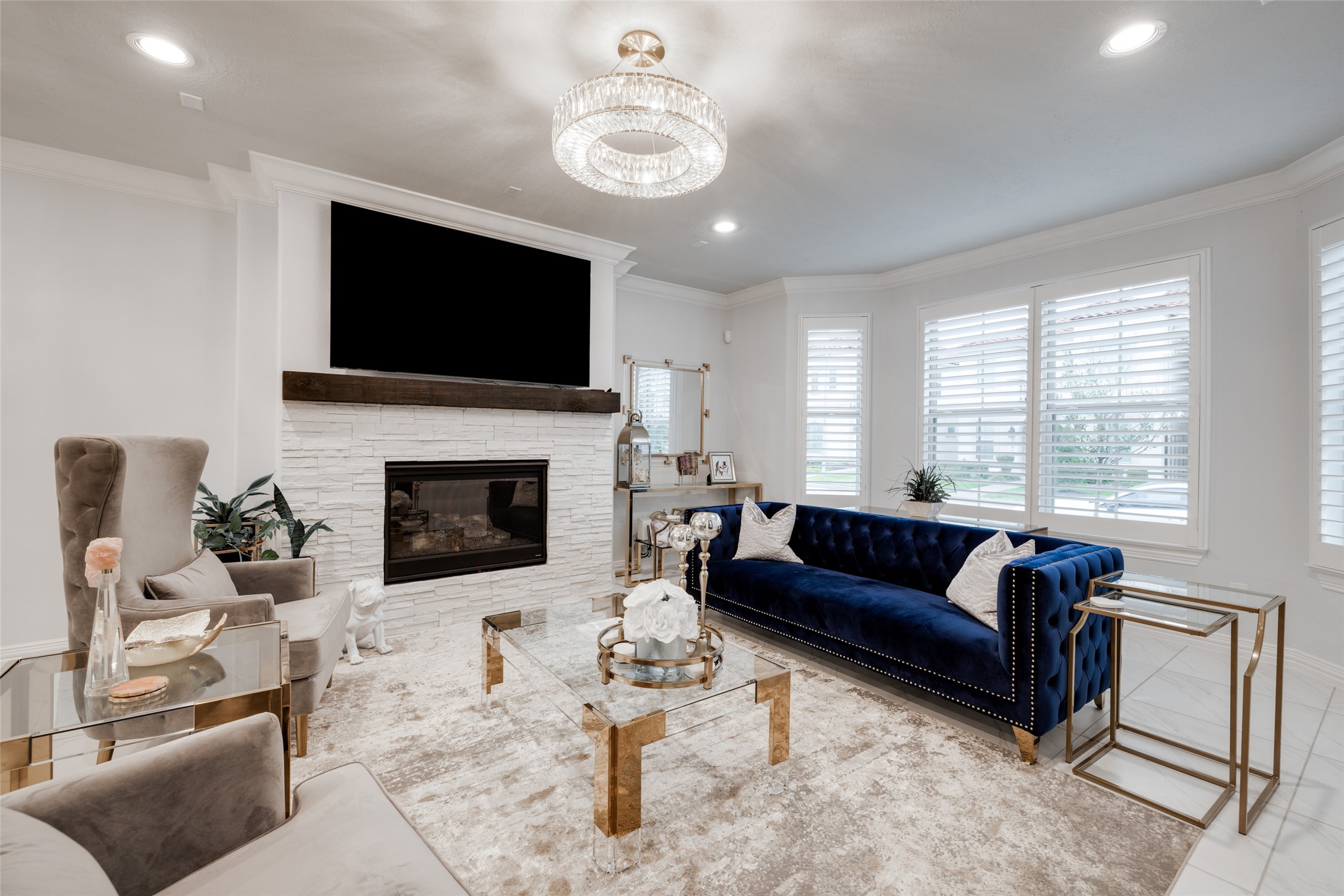 13611 Teal Bluff Lane Houston, TX 77077 - Photo 8 of 46 a living room with furniture a flat screen tv and a fireplace