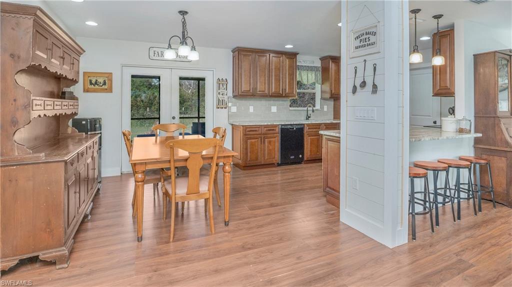 5710 Staley Road Fort Myers, FL 33905 - Photo 6 of 26 Front Door View to Dining and Kitchen
