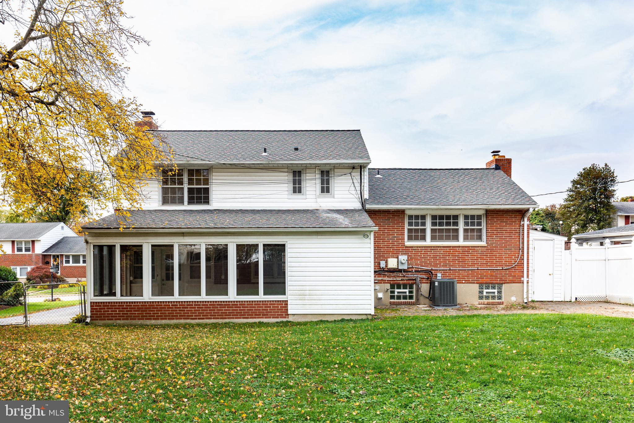 2119 Eastridge Road Lutherville-Timonium, MD 21093 - Photo 32 of 39 a front view of a house with a yard