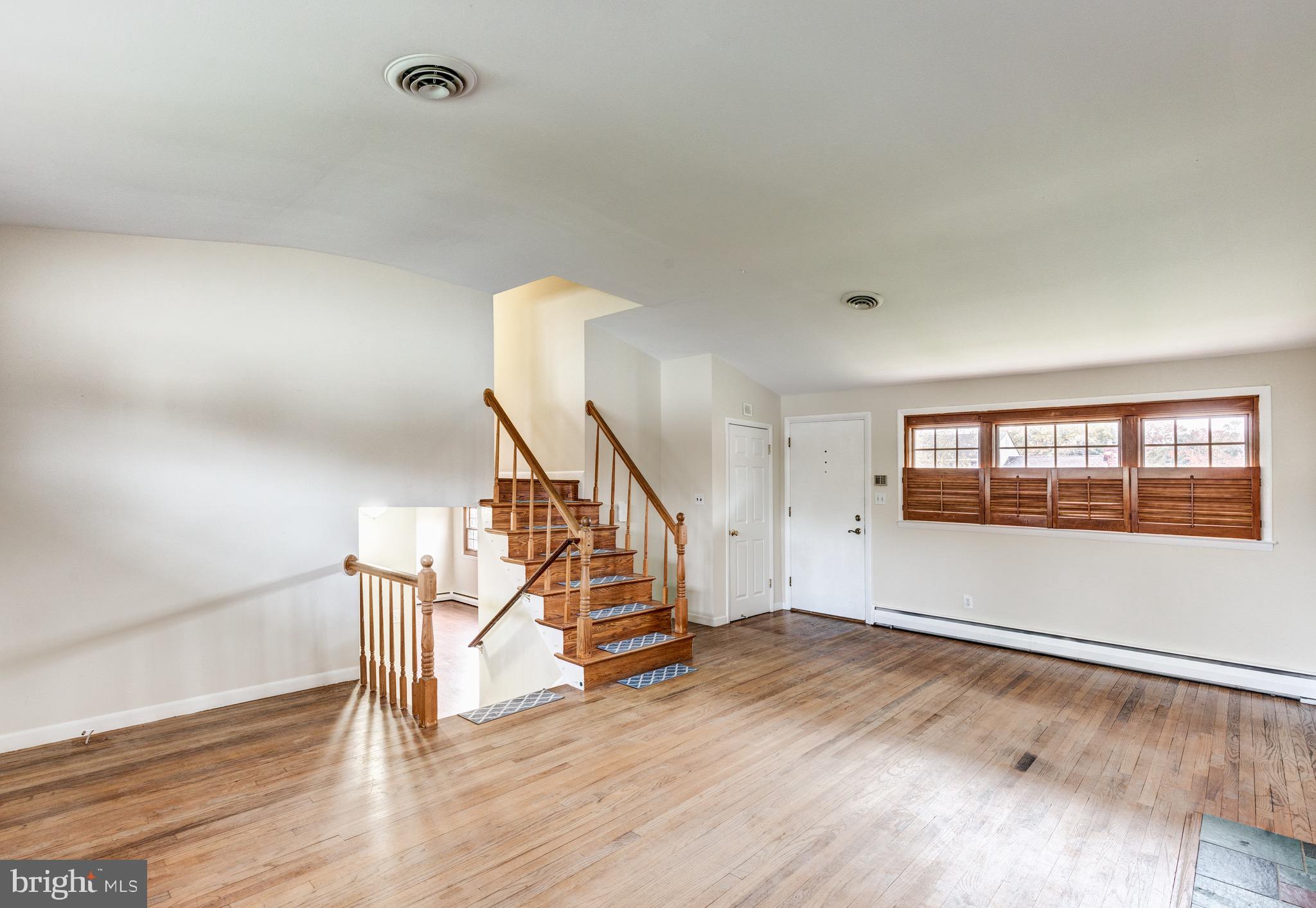2119 Eastridge Road Lutherville-Timonium, MD 21093 - Photo 4 of 39 a view of empty room with wooden floor