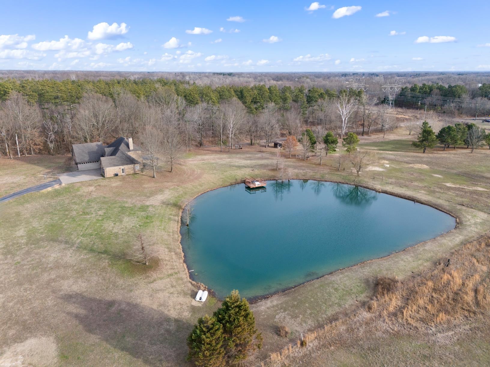 8169 Miller Road Atoka, TN 38004 - Photo 12 of 40 a view of a swimming pool and an outdoor seating