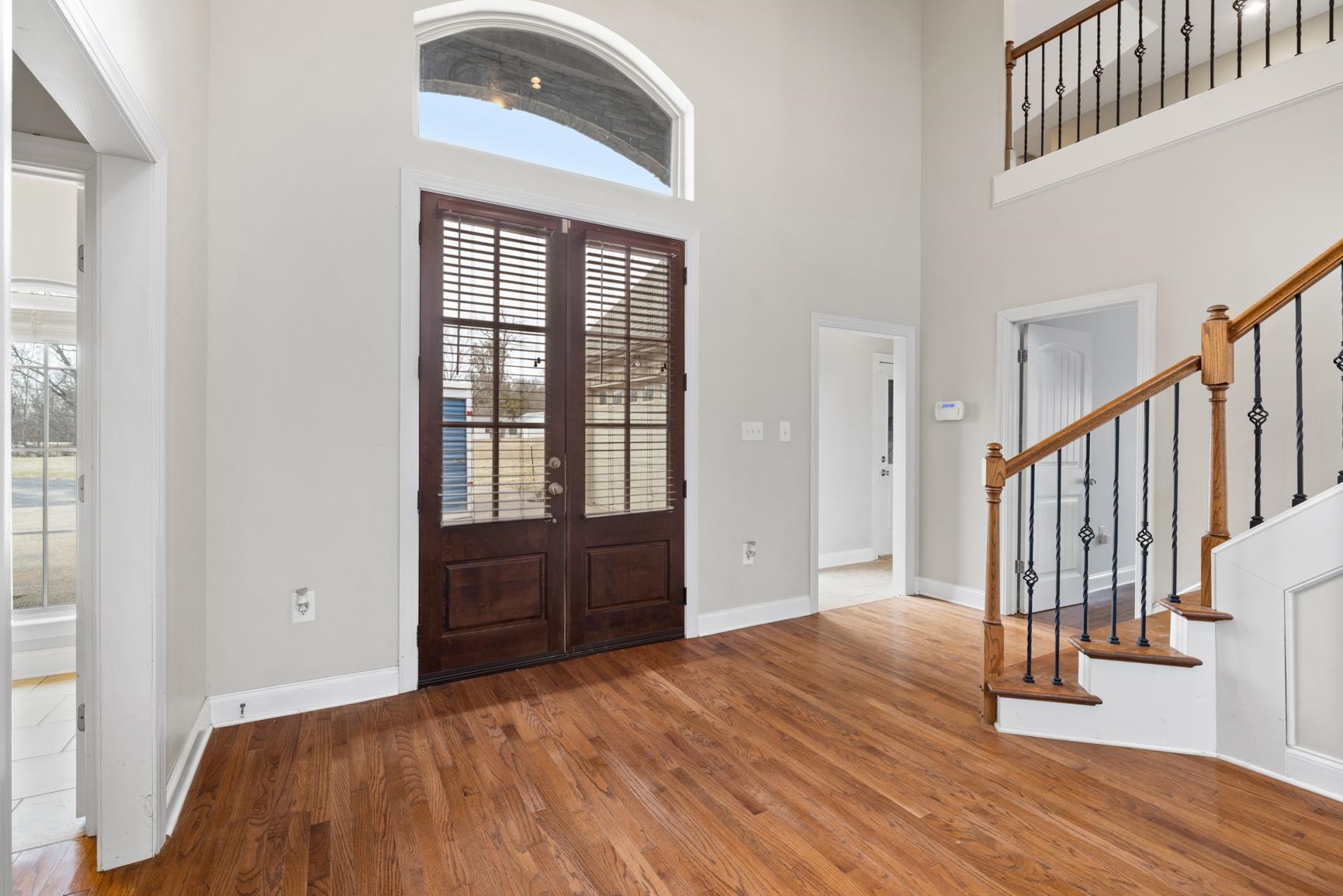 8169 Miller Road Atoka, TN 38004 - Photo 14 of 40 a bedroom with a bed and wooden floor