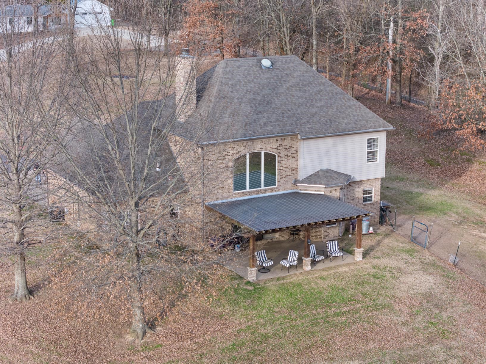 8169 Miller Road Atoka, TN 38004 - Photo 2 of 40 a view of a house with backyard and sitting area
