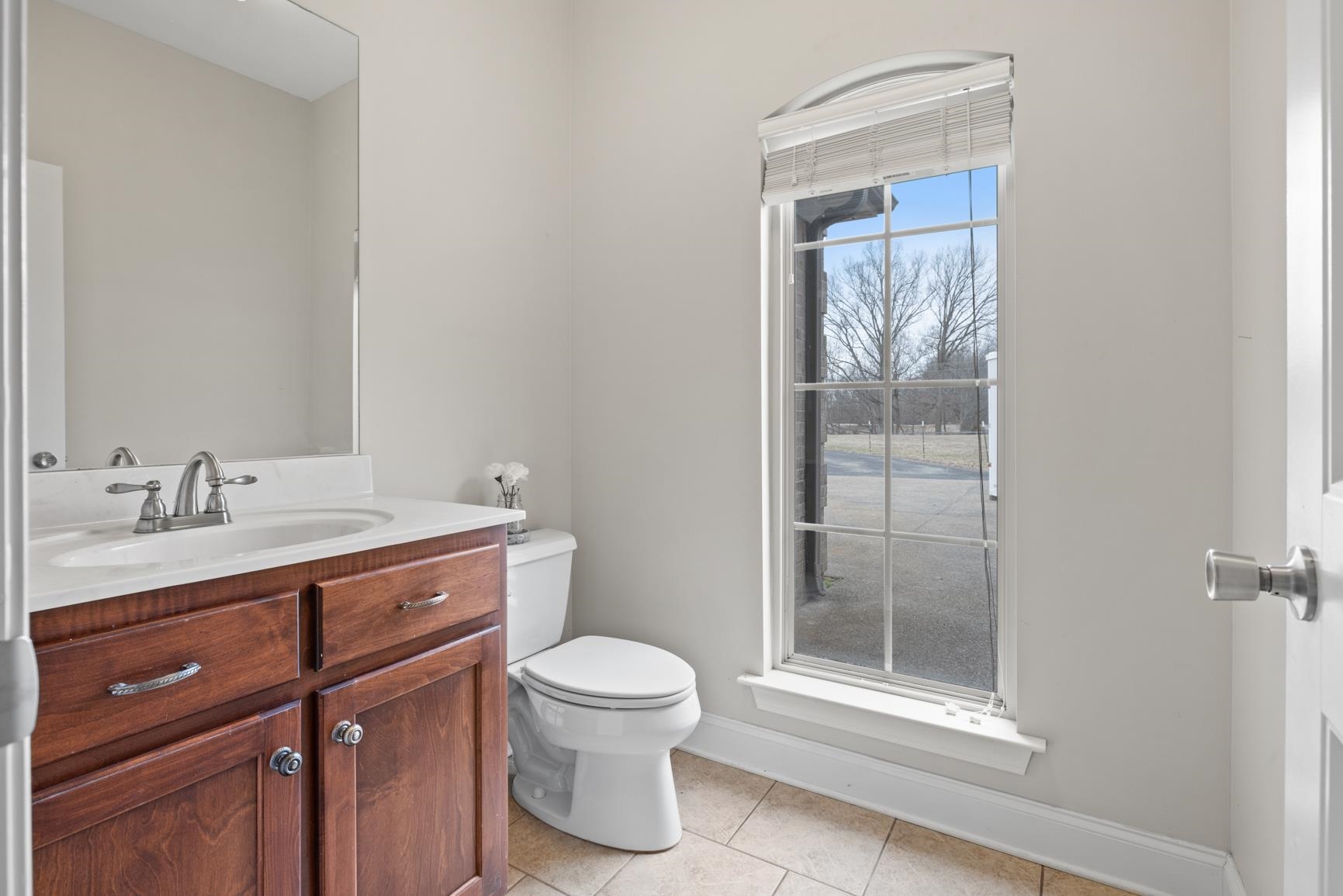 8169 Miller Road Atoka, TN 38004 - Photo 23 of 40 a bathroom with a toilet a sink and shower