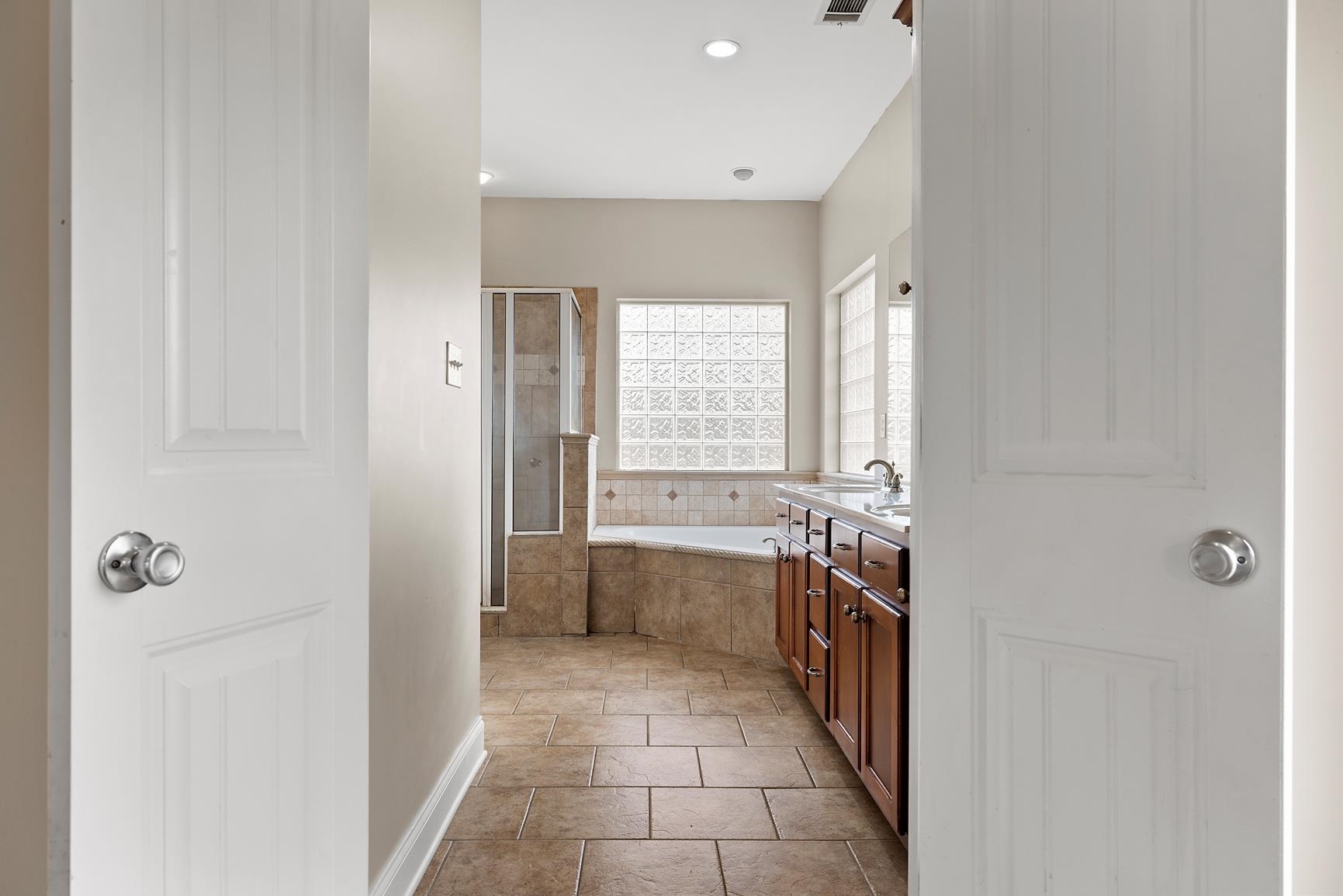 8169 Miller Road Atoka, TN 38004 - Photo 26 of 40 a bathroom with a sink a washer and dryer