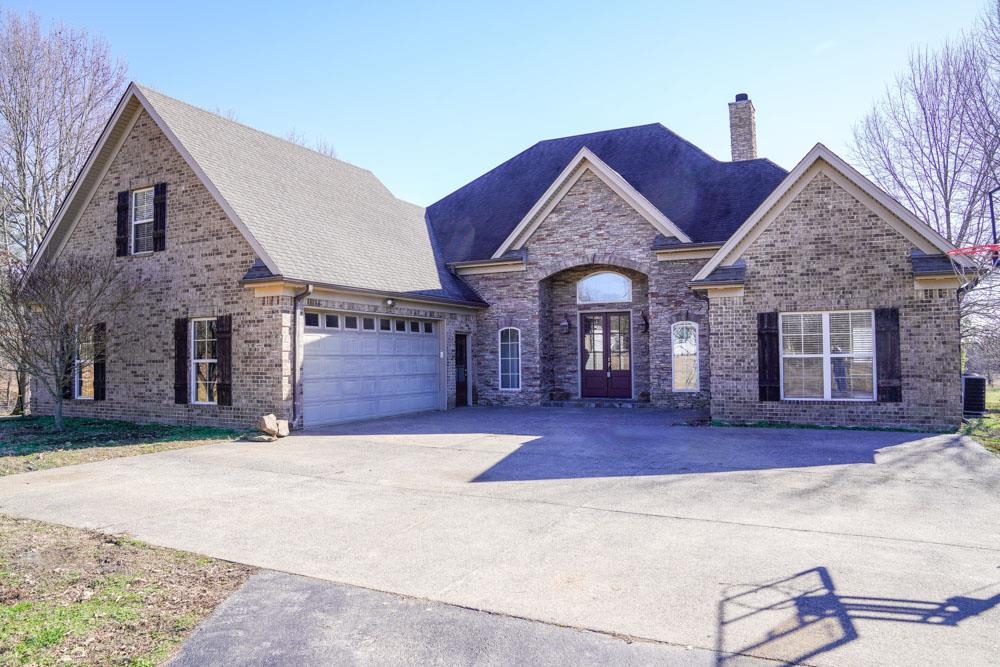 8169 Miller Road Atoka, TN 38004 - Photo 3 of 40 a view of a house with a yard