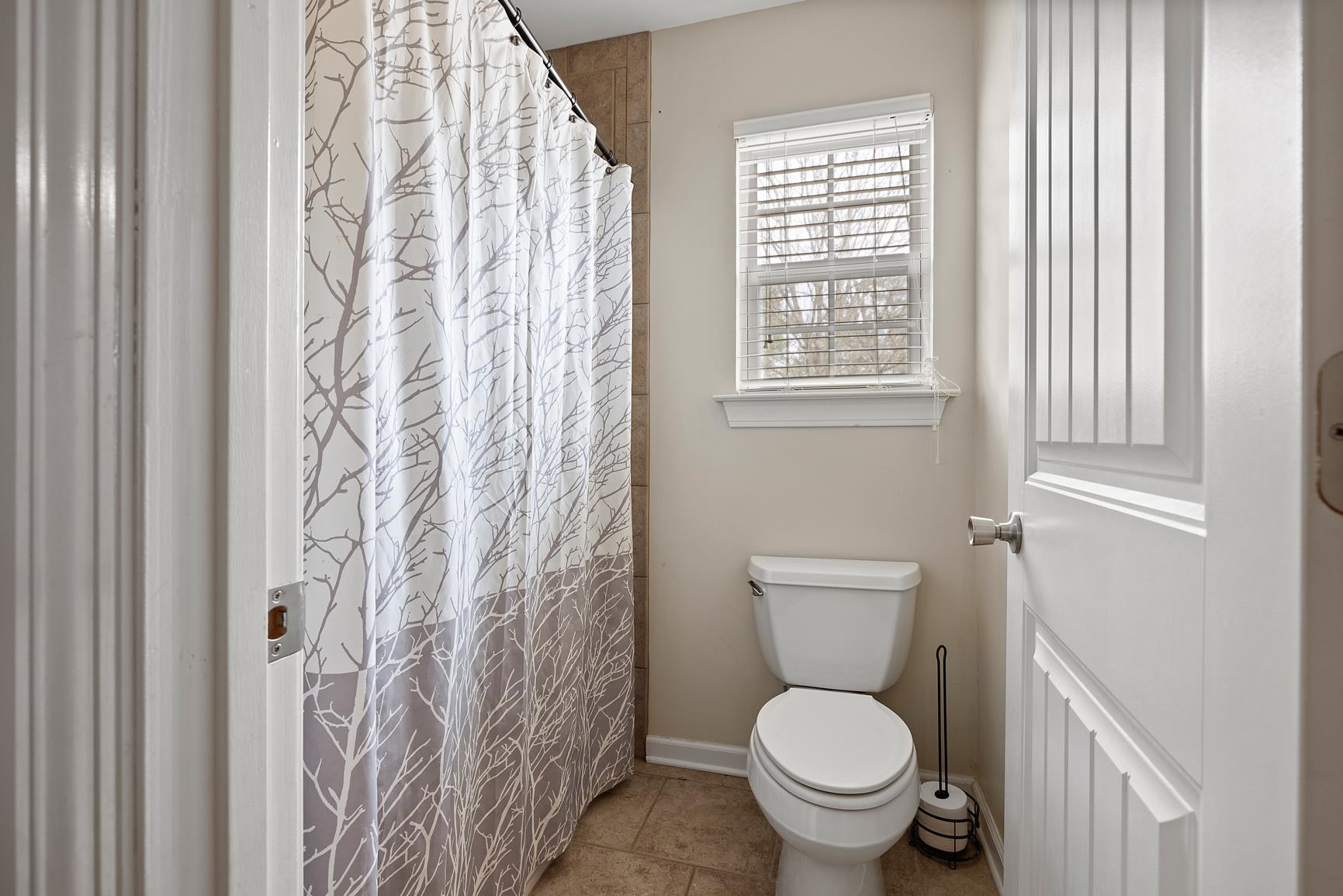 8169 Miller Road Atoka, TN 38004 - Photo 40 of 40 a a bathroom with a toilet and a sink