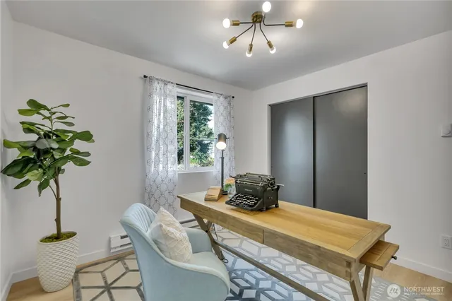 a view of a balcony with wooden floor