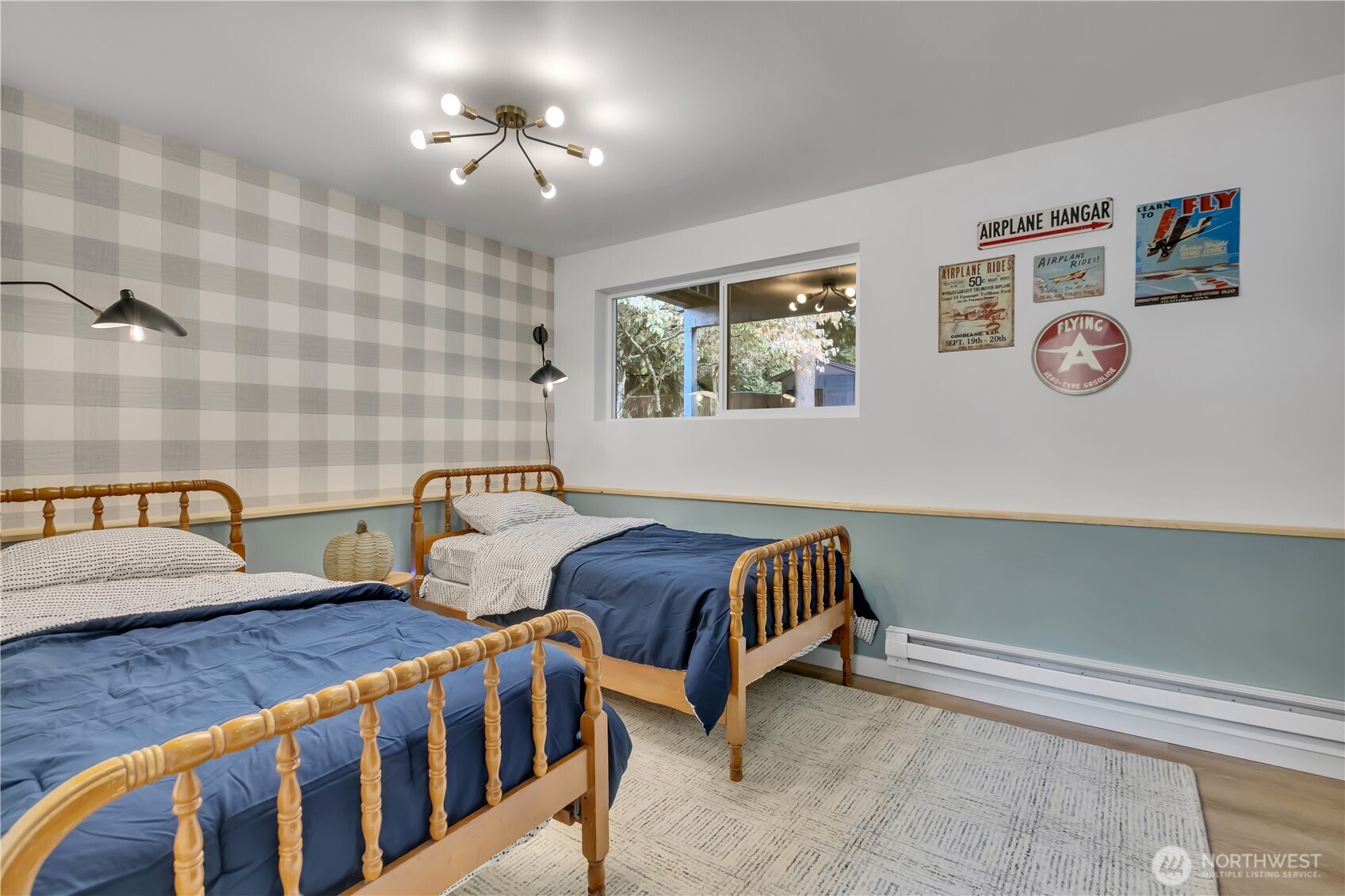 2310 Aberdeen Avenue Northeast Renton, WA 98056 - Photo 25 of 35 a bedroom with double bed and a window