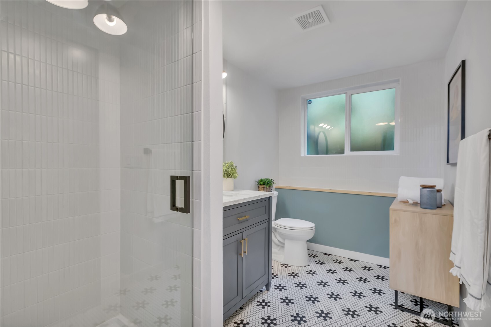 2310 Aberdeen Avenue Northeast Renton, WA 98056 - Photo 28 of 35 a bathroom with a sink toilet and shower