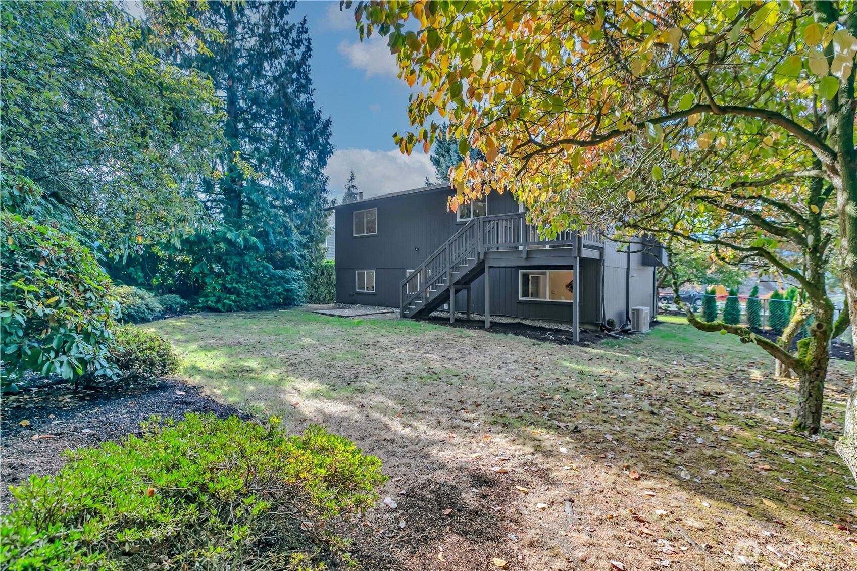 2310 Aberdeen Avenue Northeast Renton, WA 98056 - Photo 33 of 35 a view of a house with a yard and tree s