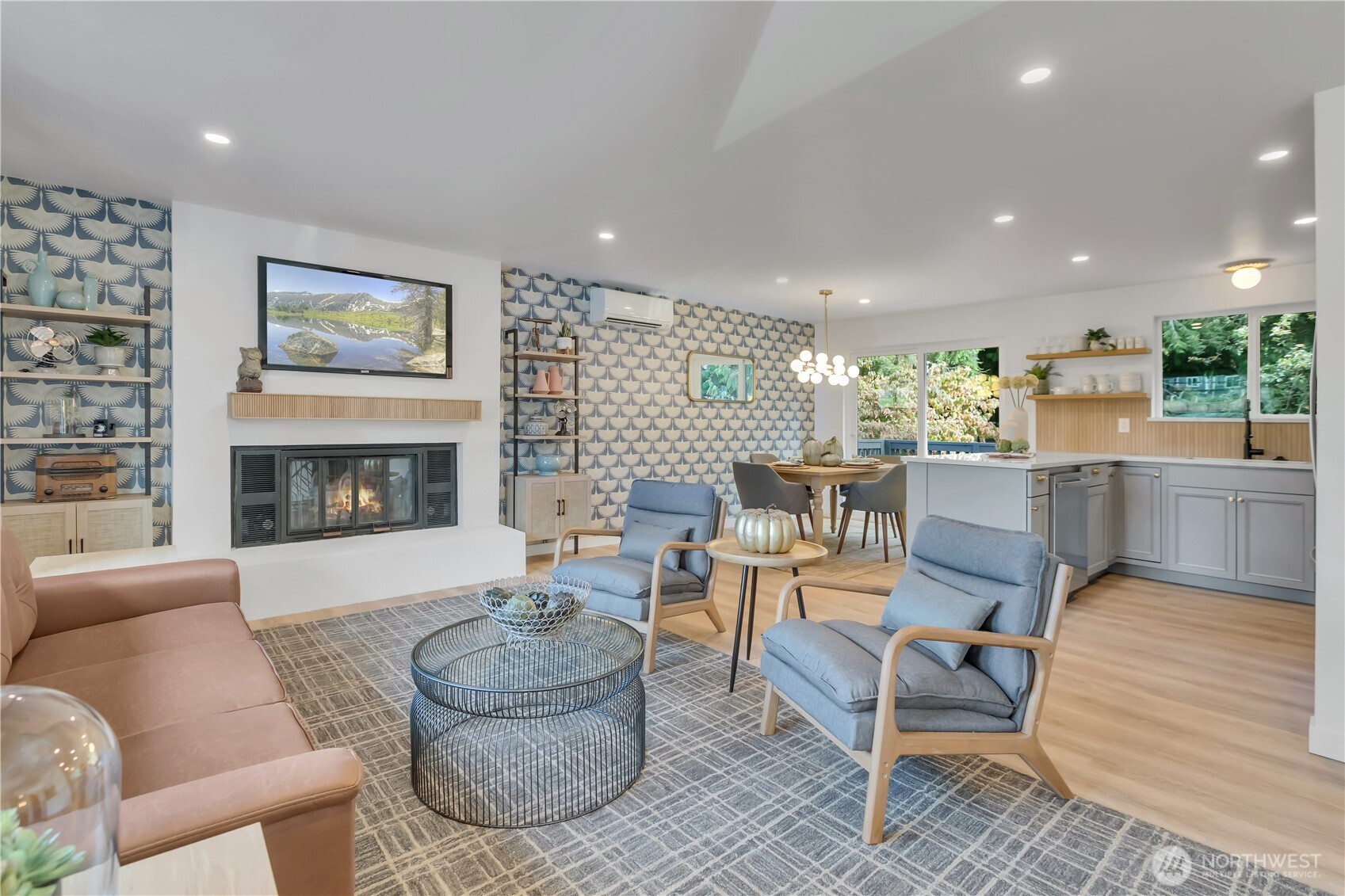 2310 Aberdeen Avenue Northeast Renton, WA 98056 - Photo 5 of 35 a living room with furniture and a fireplace