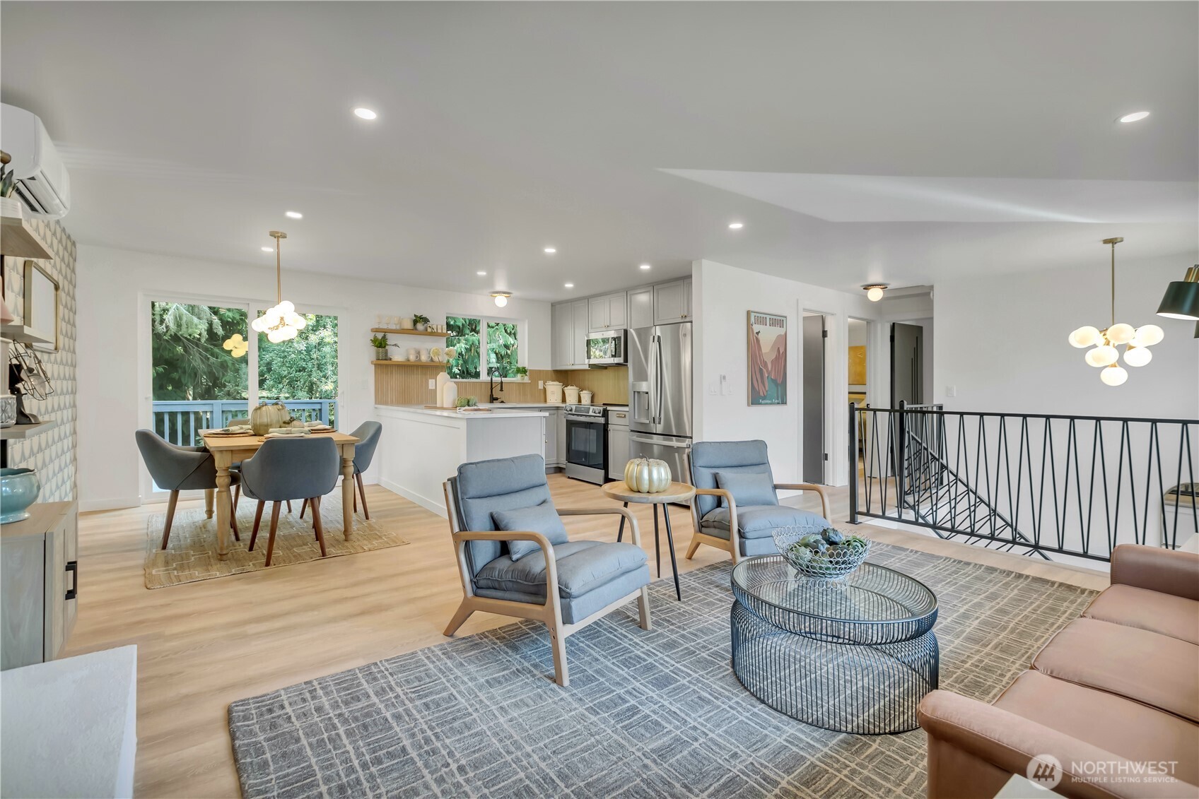 2310 Aberdeen Avenue Northeast Renton, WA 98056 - Photo 6 of 35 a living room with furniture wooden floor and a rug