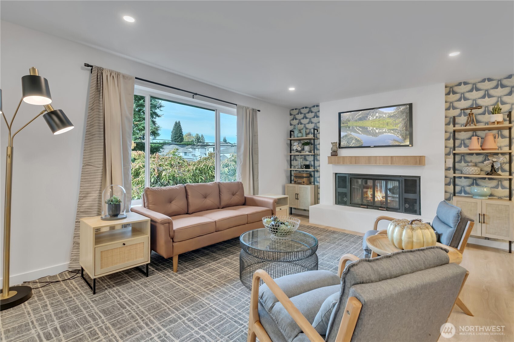 2310 Aberdeen Avenue Northeast Renton, WA 98056 - Photo 7 of 35 a living room with furniture and a fireplace