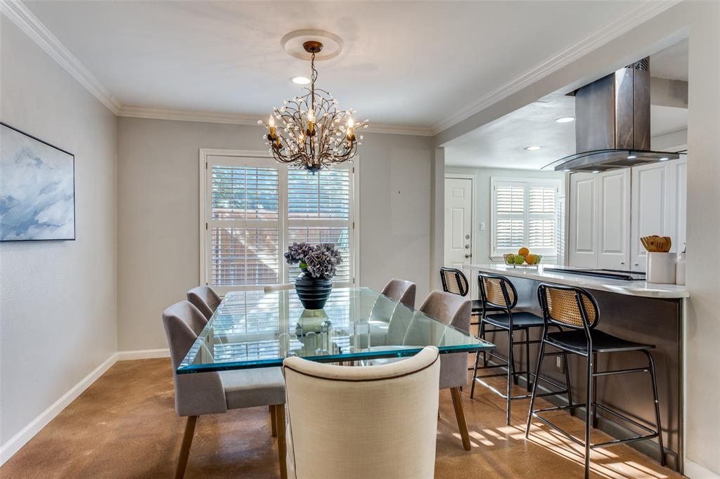 1295 Roaring Springs Road Fort Worth, TX 76114 - Photo 7 of 17 a view of a dining room with furniture window and wooden floor