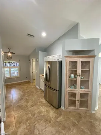 a view of a kitchen with an empty space