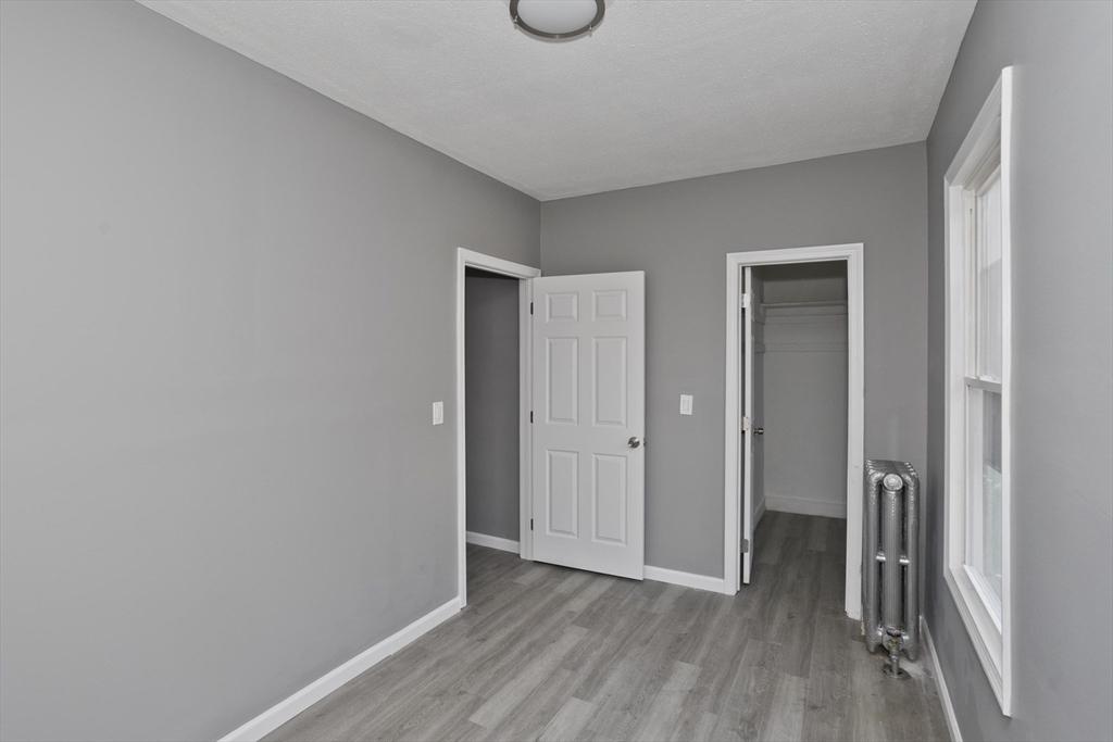 44 Eagle Street Springfield, MA 01107 - Photo 20 of 38 a view of hallway with wooden floor