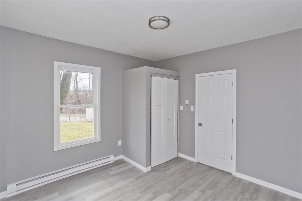 44 Eagle Street Springfield, MA 01107 - Photo 33 of 38 a view of an empty room with window and closet area