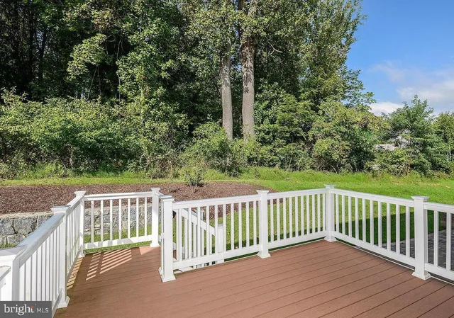 a view of a wooden fence