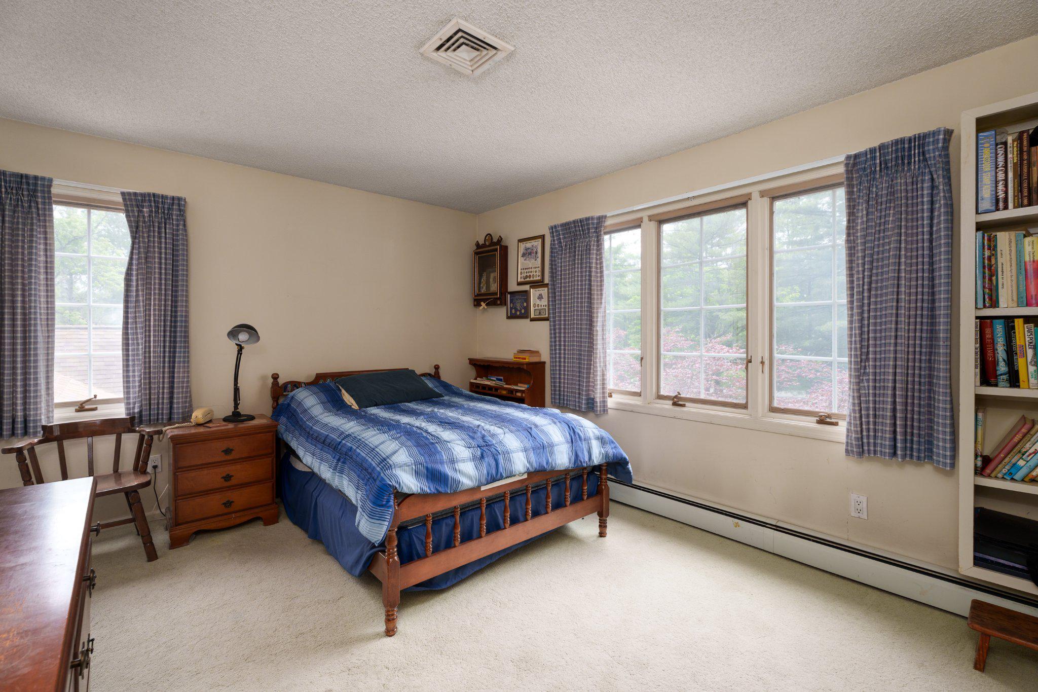 338 Gallup Road Princeton, NJ 08540 - Photo 34 of 53 a bed sitting in a bedroom next to a window