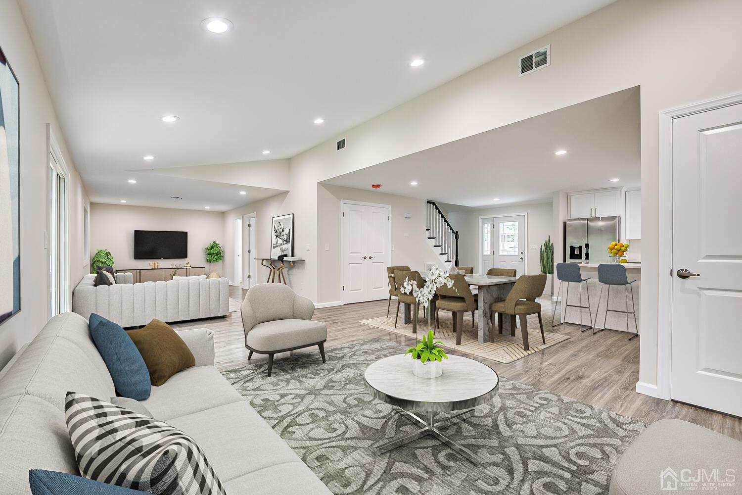 47 West Hill Road Colonia, NJ 07067 - Photo 2 of 18 a living room with furniture and kitchen view