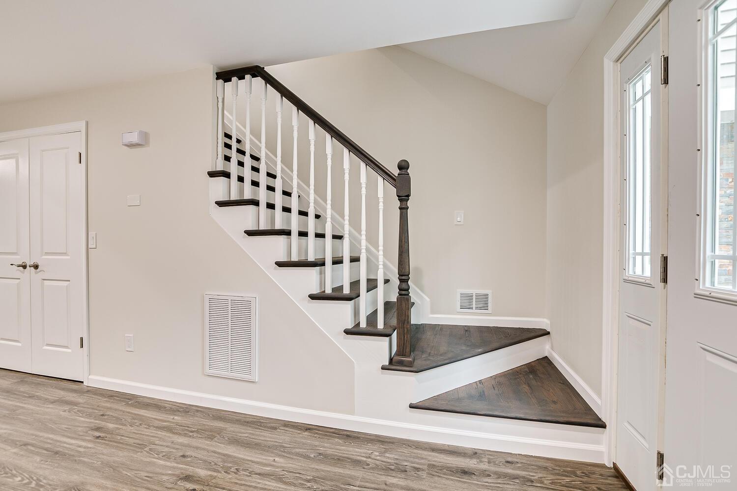 47 West Hill Road Colonia, NJ 07067 - Photo 5 of 18 a view of entryway and hall with wooden floor
