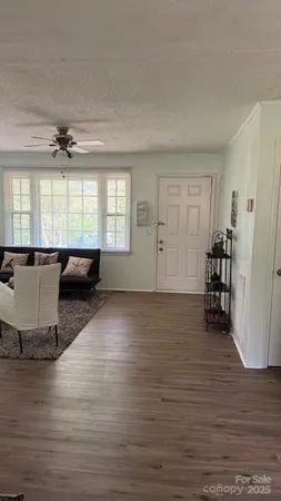 a view of dining room and wooden floor