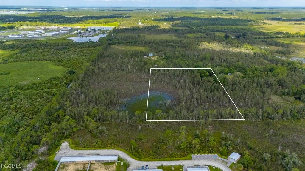 33715 Oil Well Road Punta Gorda, FL 33955 - Photo 13 of 15 a view of a balcony with an outdoor space