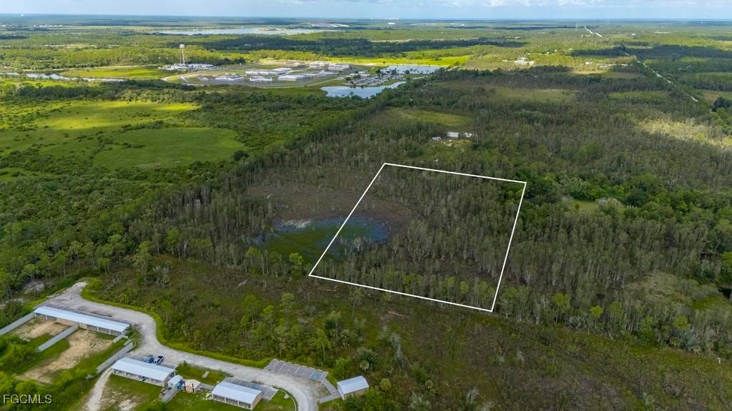33715 Oil Well Road Punta Gorda, FL 33955 - Photo 15 of 15 a view of a balcony with an outdoor space
