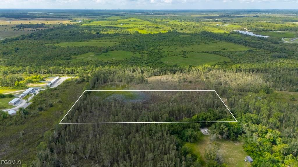 33715 Oil Well Road Punta Gorda, FL 33955 - Photo 2 of 15 a view of an outdoor space and swimming pool