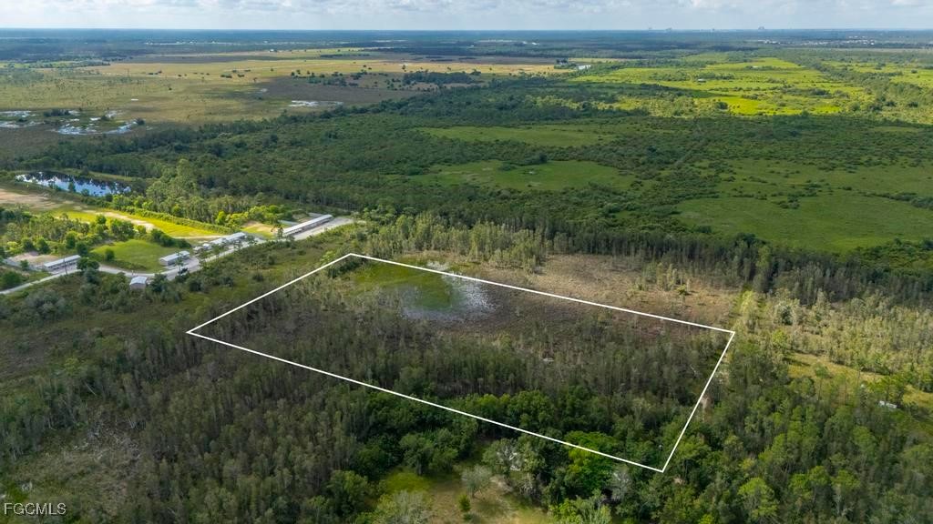 33715 Oil Well Road Punta Gorda, FL 33955 - Photo 3 of 15 a view of a tennis court