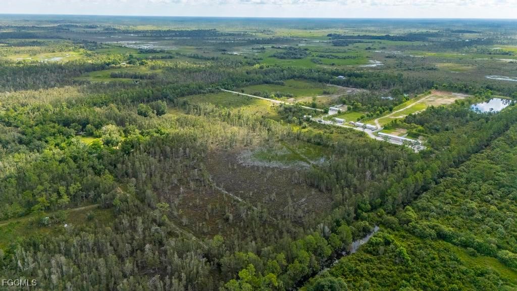 33715 Oil Well Road Punta Gorda, FL 33955 - Photo 8 of 15 a view of an outdoor space and a lake view