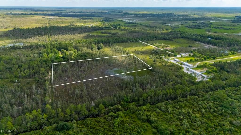 33715 Oil Well Road Punta Gorda, FL 33955 - Photo 9 of 15 a view of a field with an ocean view