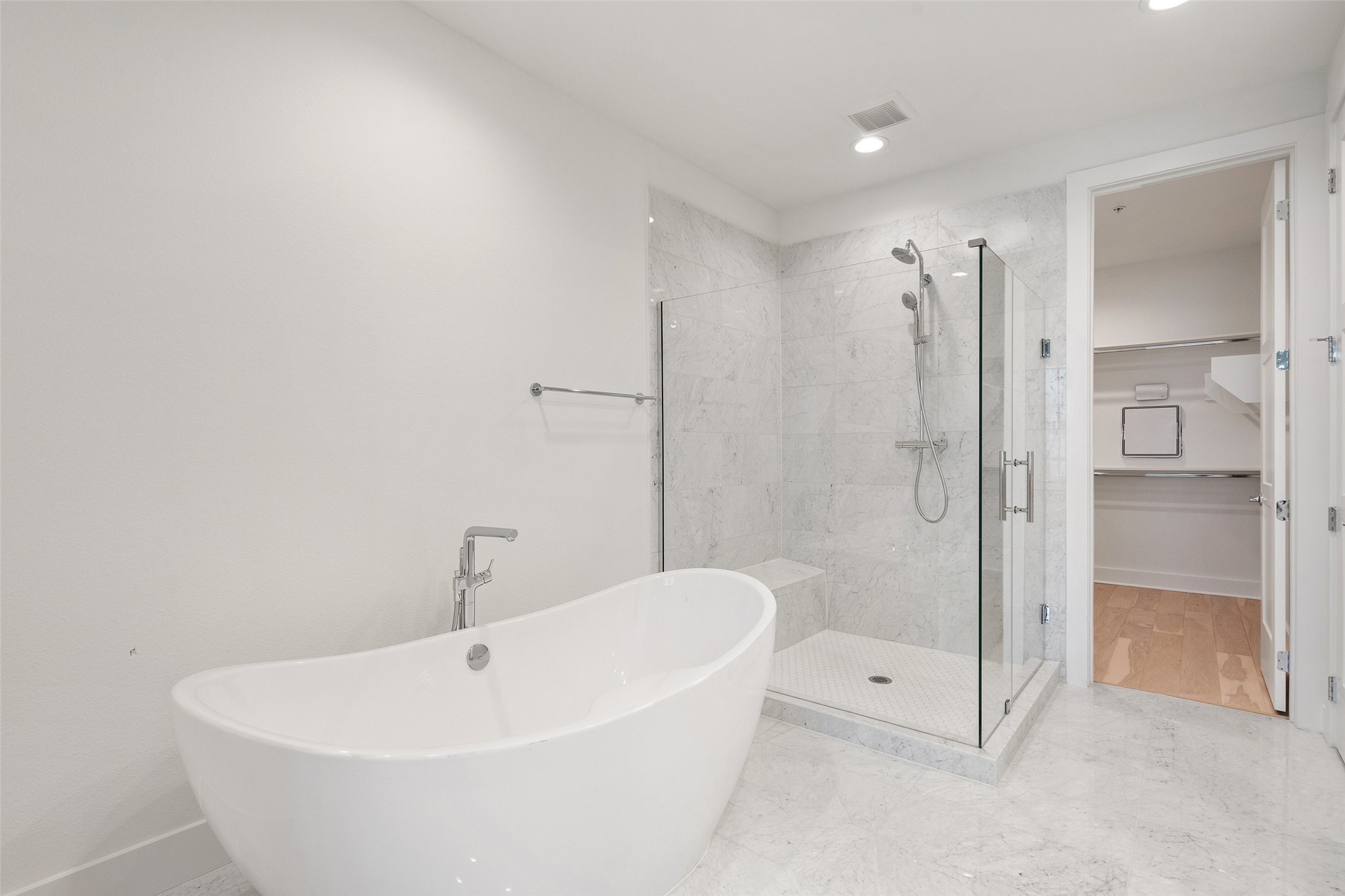 2805 McCurdy Street, Unit 6 Austin, TX 78723 - Photo 21 of 38 a white bath tub sitting next to a bathroom