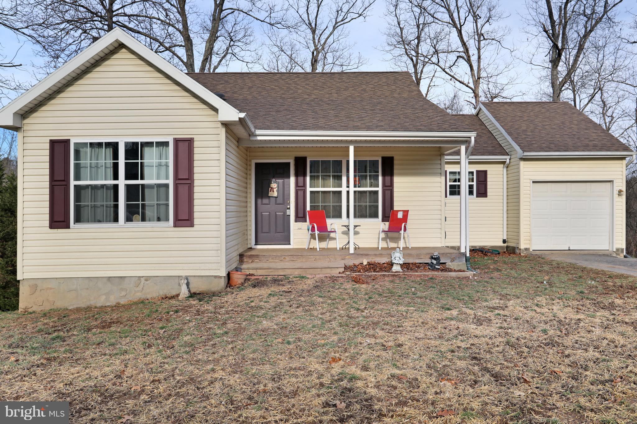 140 Raft Court Inwood, WV 25428 - Photo 2 of 34 a house view with a outdoor space