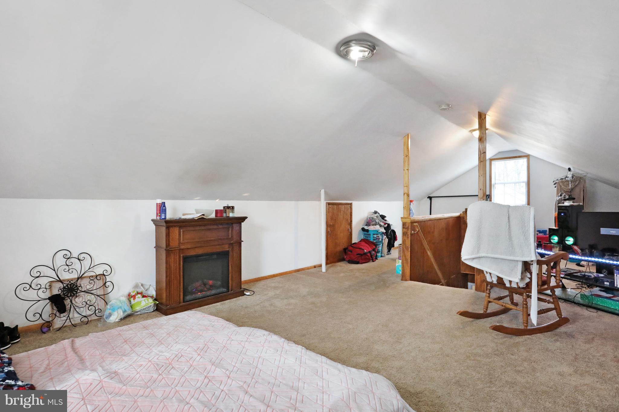 140 Raft Court Inwood, WV 25428 - Photo 23 of 34 a bed room with a bed and a chair