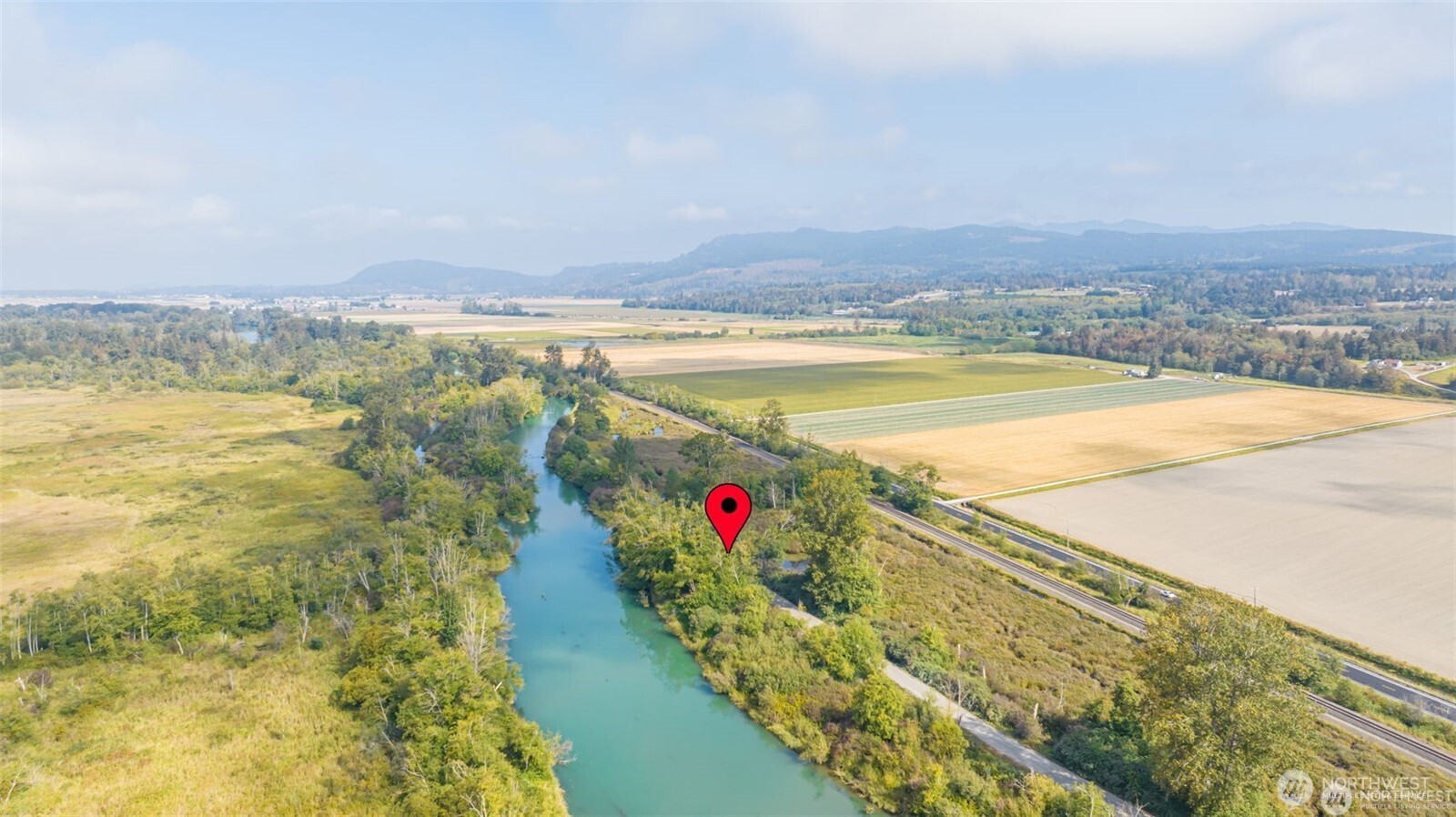 0 Milltown Crossing Road Mount Vernon, WA 98273 - Photo 5 of 14 a view of an ocean and a beach