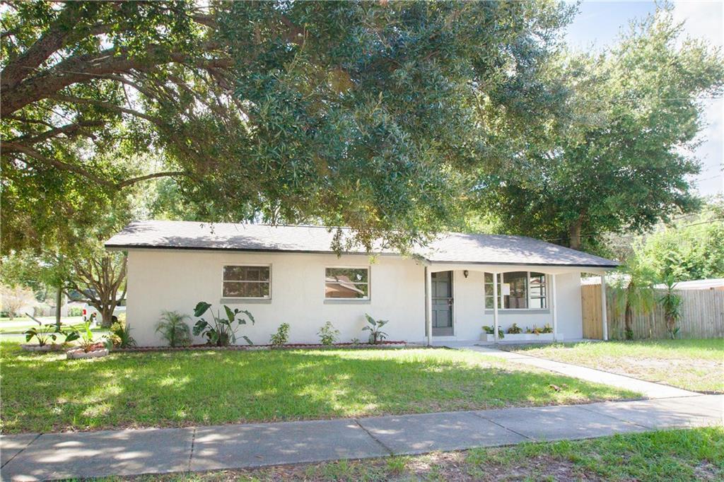 800 Gaston Foster Road Orlando, FL 32807 - Photo 1 of 1 front view of a house with a yard