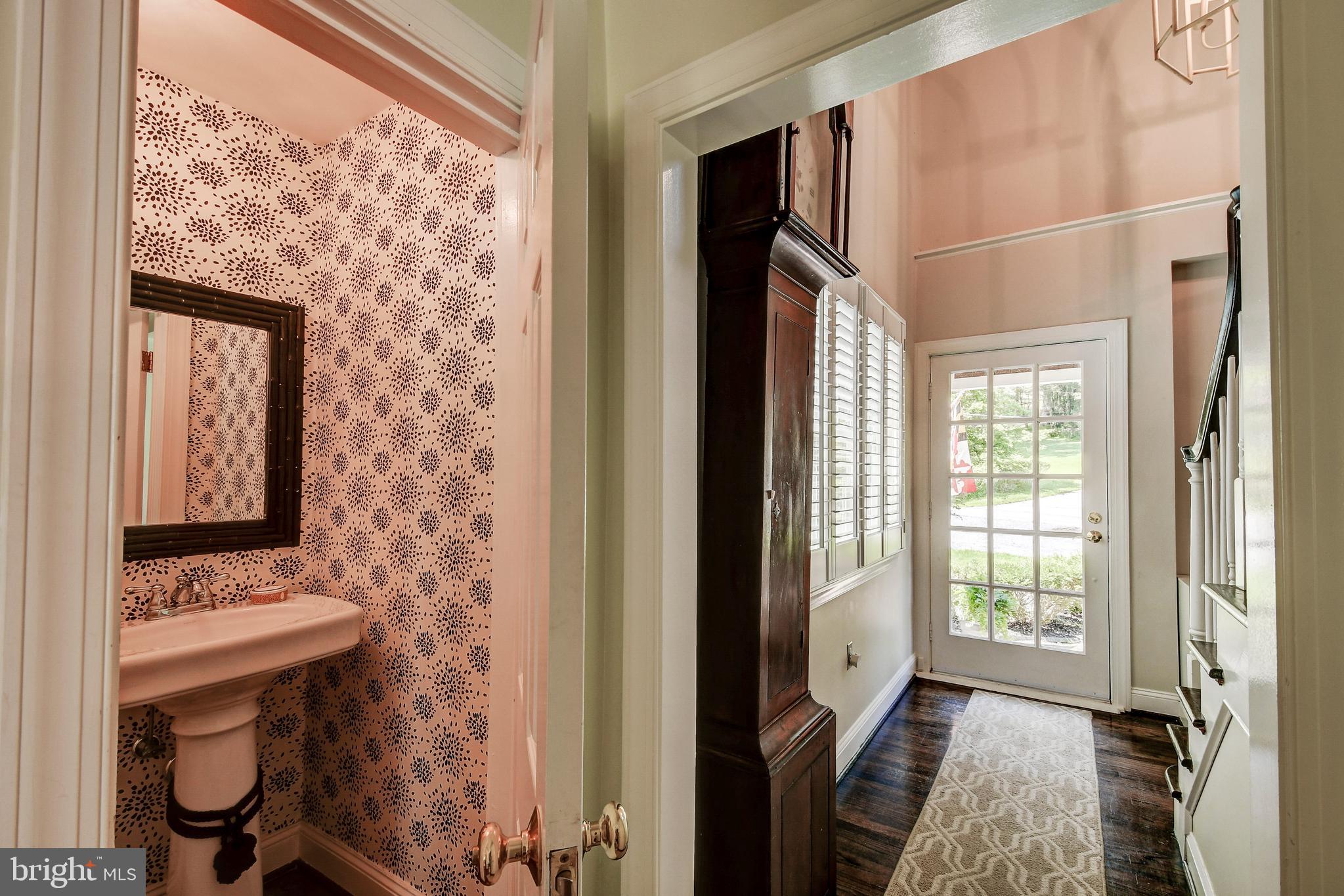 1741 Circle Road Baltimore, MD 21204 - Photo 6 of 40 a view of a bathroom with a sink and mirror
