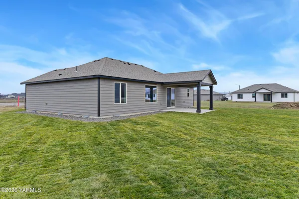 a house view with a garden space