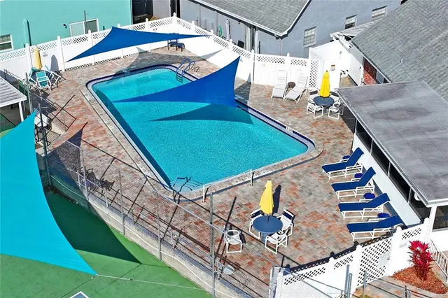 a view of a back yard of the house