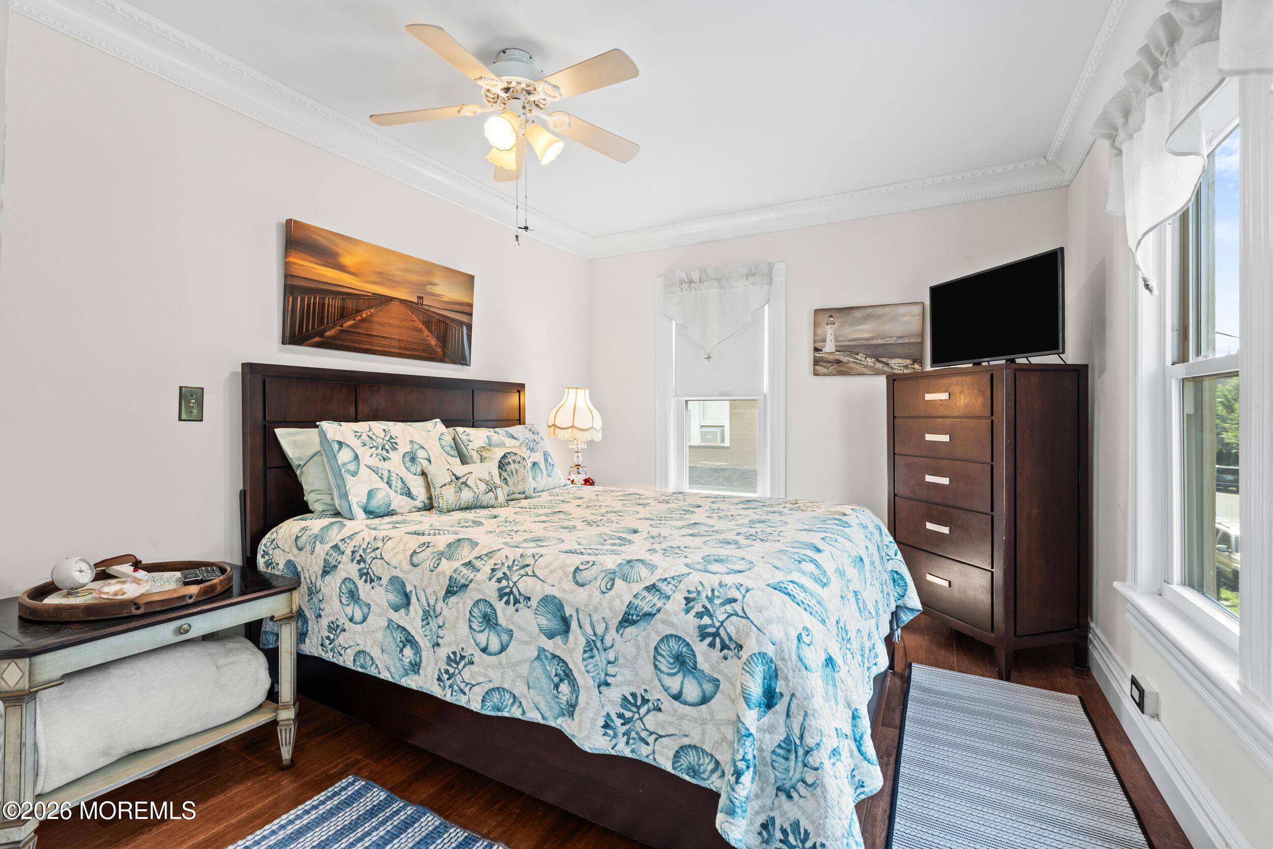 75 Webb Avenue, Unit UPPER WEEKLY Ocean Grove, NJ 07756 - Photo 19 of 41 a bedroom with a bed and a television