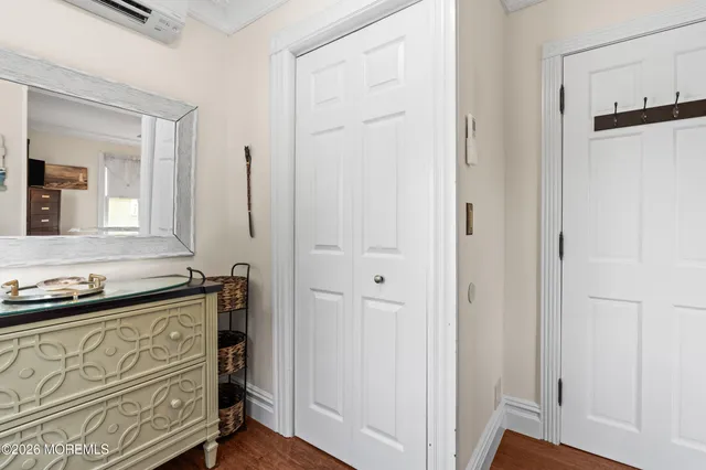 a bed room with a bed and a chair