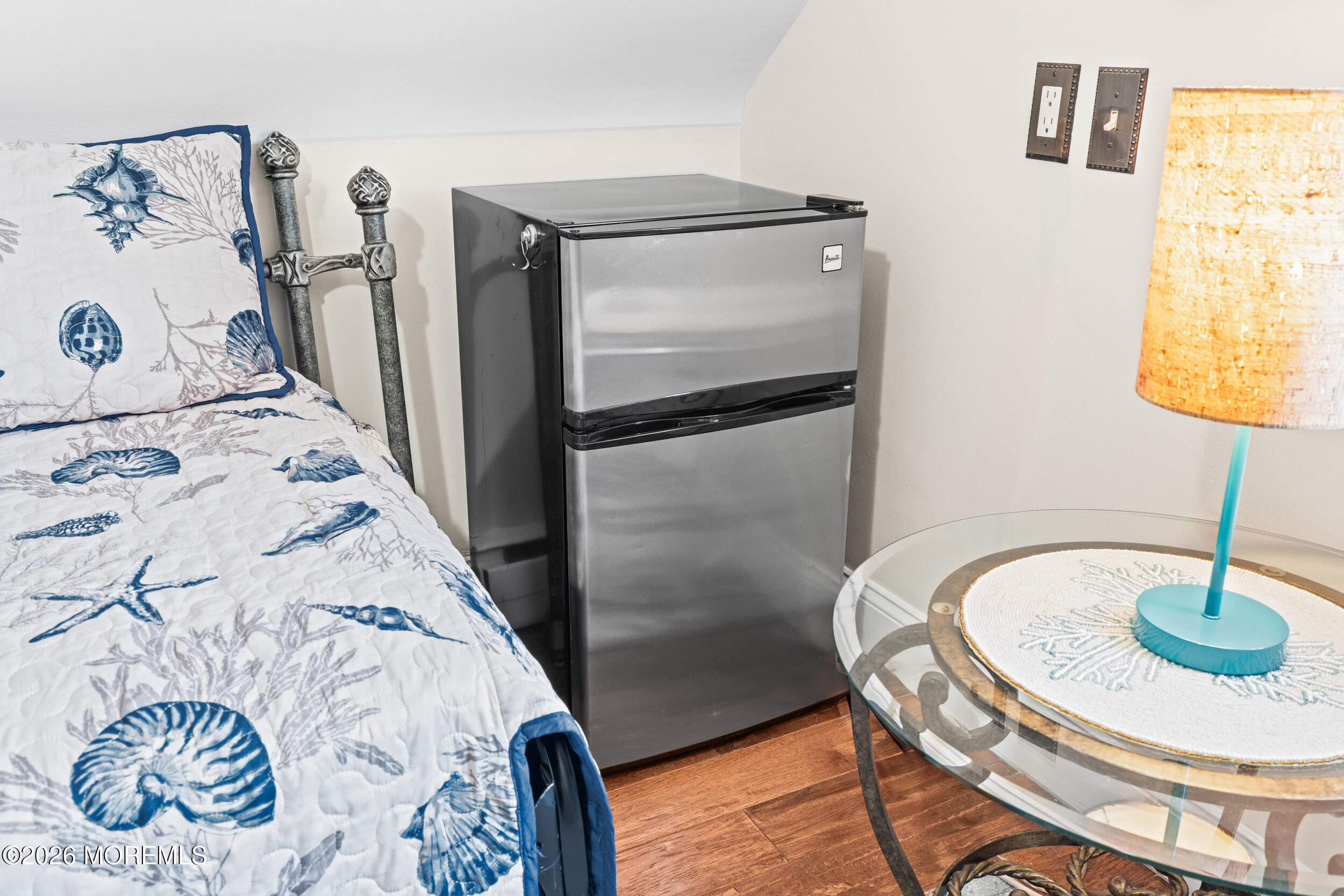 75 Webb Avenue, Unit UPPER WEEKLY Ocean Grove, NJ 07756 - Photo 30 of 41 a bathroom with a sink and a mirror