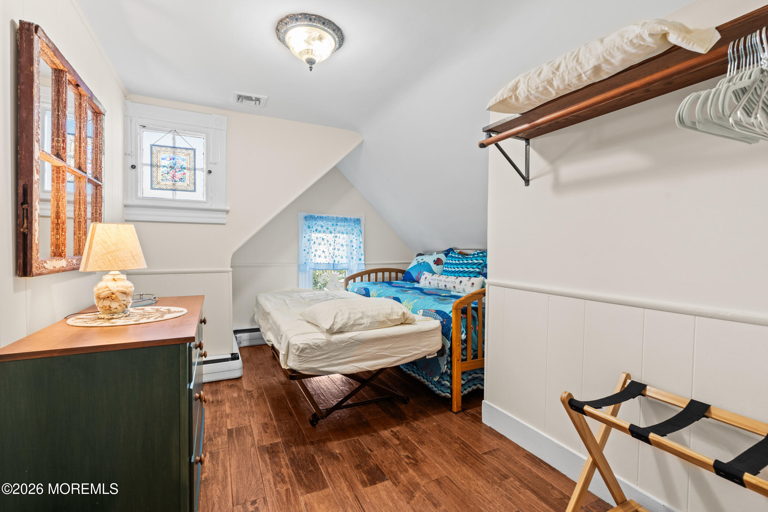75 Webb Avenue, Unit UPPER WEEKLY Ocean Grove, NJ 07756 - Photo 34 of 41 a living room with furniture and a wooden floor