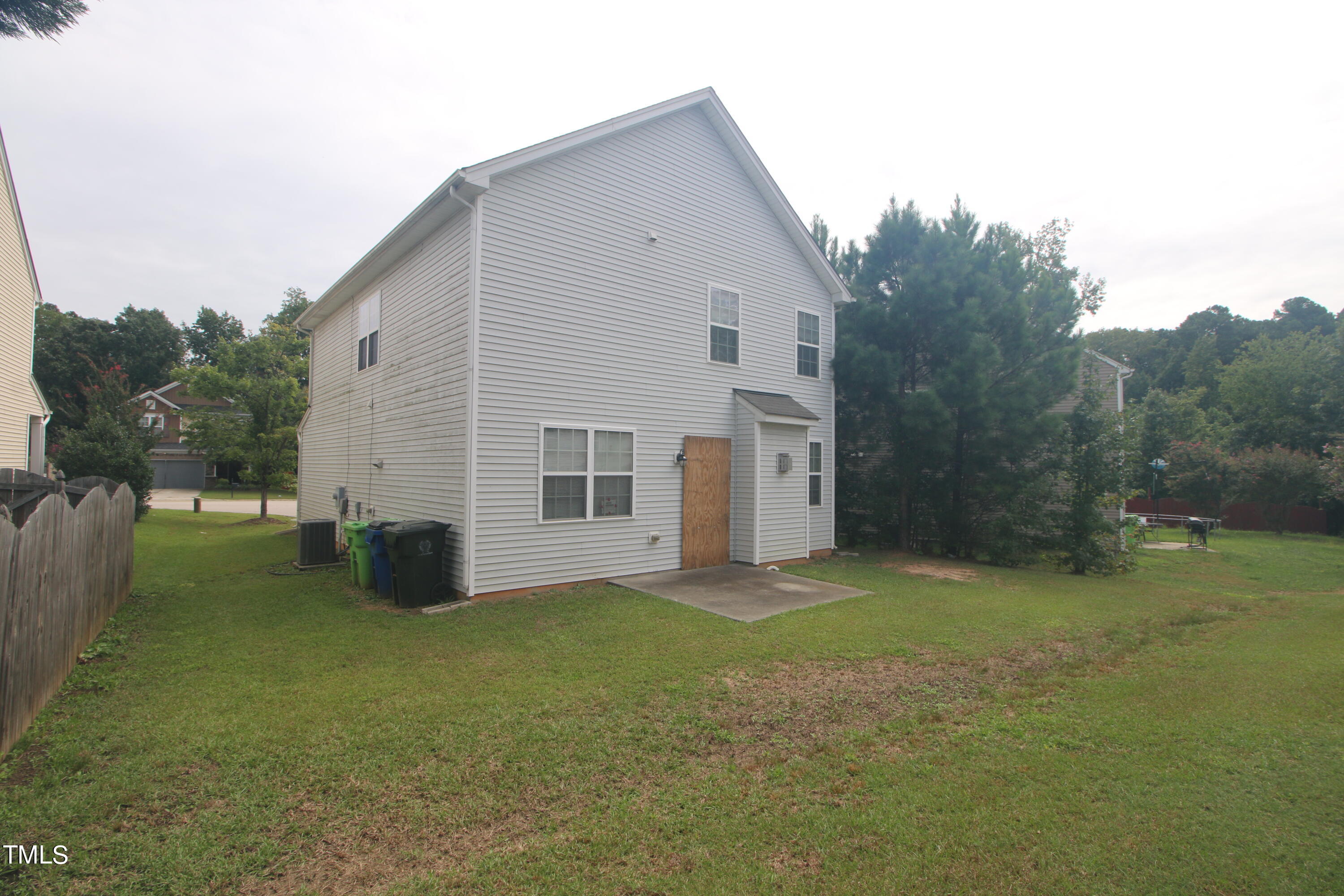 3622 Brideveil Court Raleigh, NC 27610 - Photo 11 of 12 a view of a house with a yard