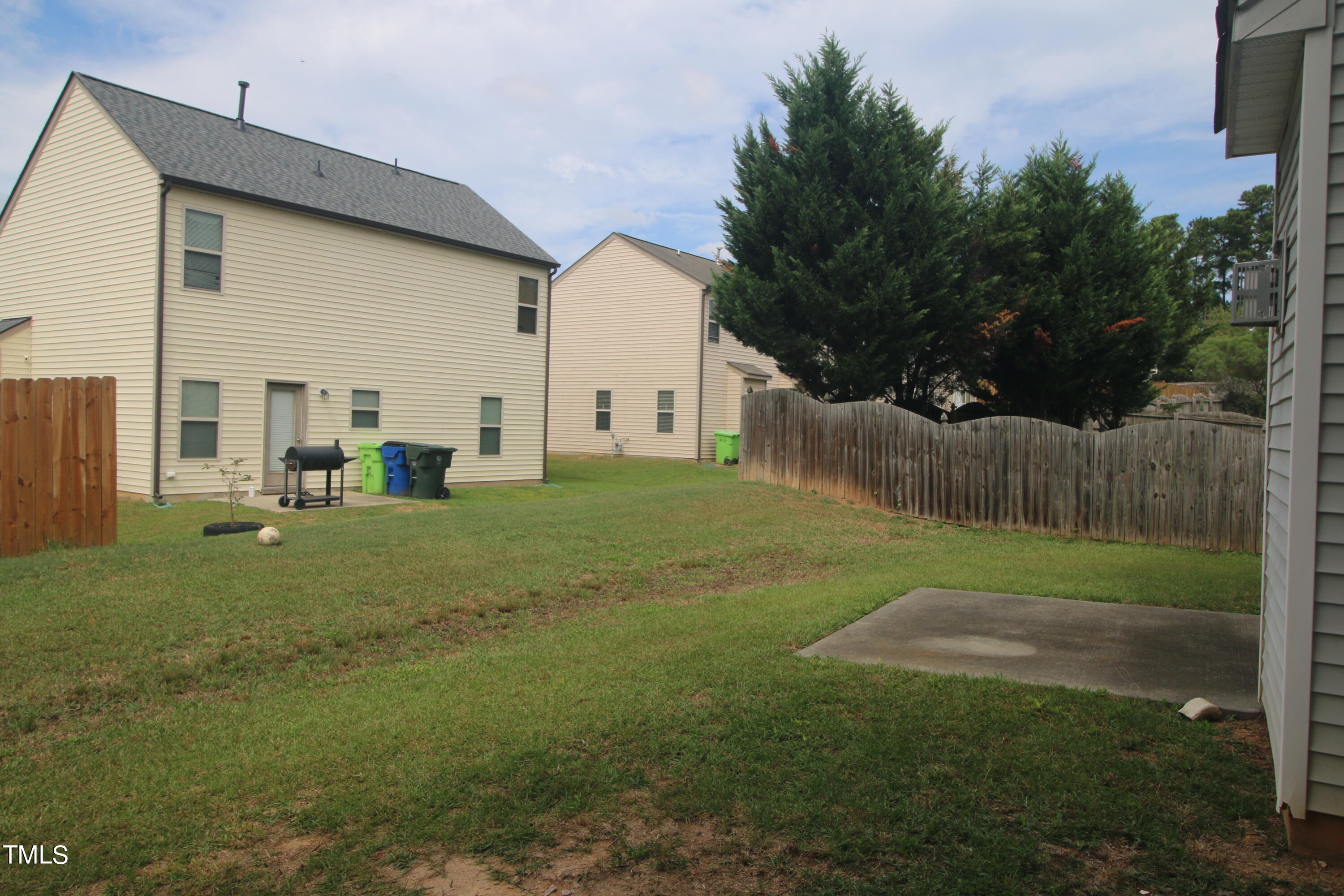 3622 Brideveil Court Raleigh, NC 27610 - Photo 12 of 12 a view of backyard of house with green space
