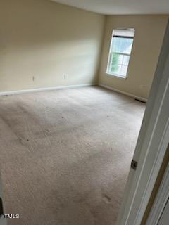 3622 Brideveil Court Raleigh, NC 27610 - Photo 6 of 12 an empty room with windows